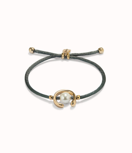 Pulsera de hilo negroso con perla shell fornitura bañada en oro 18k.